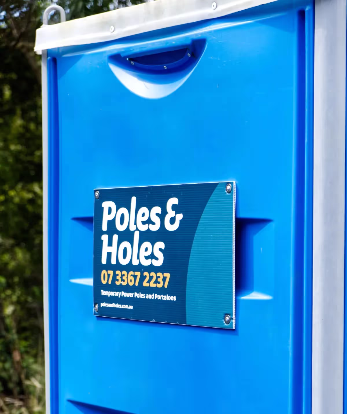 Poles and Holes sewer-connect portaloo