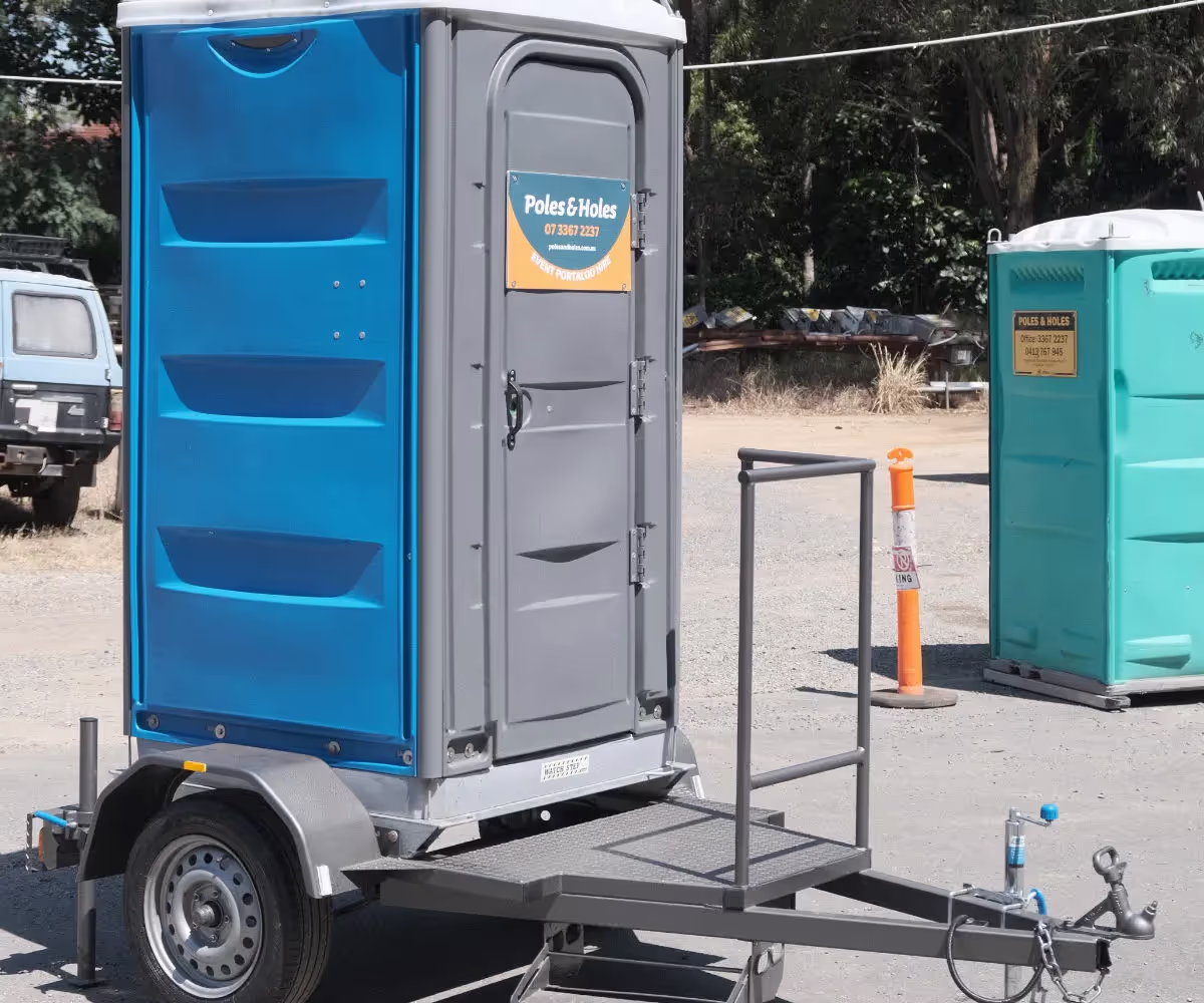 Poles and Holes trailer-mounted portaloo on its trailer